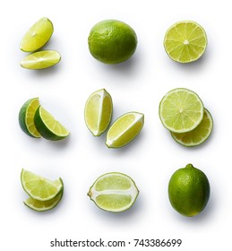 Set of fresh whole and cut lime and slices isolated on white background. From top view - Shutterstock ID 743386699