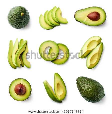 Set of fresh whole and sliced avocado isolated on white background. Top view