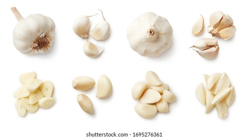 Set of fresh whole and sliced garlics isolated on white background. Top view