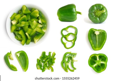 Set of fresh whole and sliced green bell pepper isolated on white background. Top view.