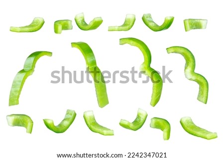 Set of fresh whole and sliced green bell pepper isolated on white background. With clipping path. Full depth of field. Focus stacking