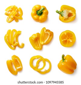 Set of fresh whole and sliced sweet yellow pepper isolated on white background. Top view