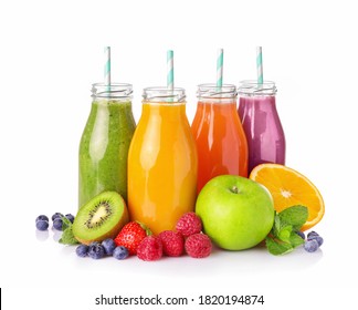 Set of fruit juices in glass bottles isolated on white background.