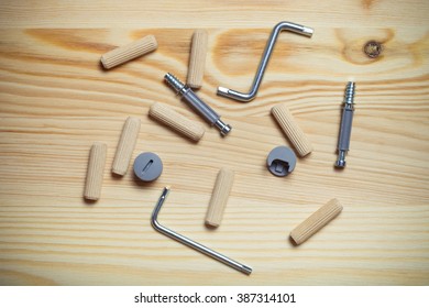 Set Of Furniture Accessories On Light Wooden Background. Top View. Toned.