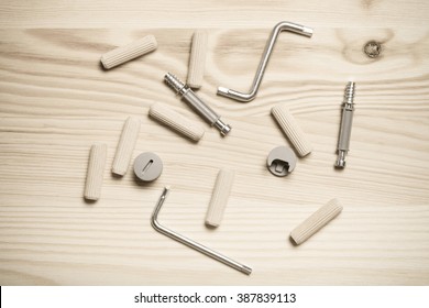 Set Of Furniture Accessories On Light Wooden Background. Top View. Toned.