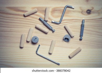 Set Of Furniture Accessories On Light Wooden Background. Top View. Toned.