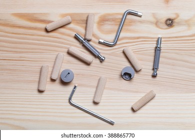 Set Of Furniture Accessories On Light Wooden Background. Top View.