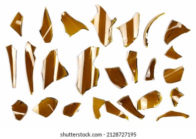 Set glass shards, broken beer bottle isolated on white, top view