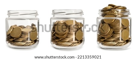 Set of glasses jars with coins on white background. Banner design