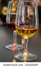 Set Of Glasses Of White And Ruby Port Wine