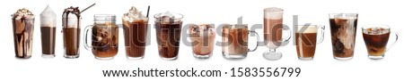Set of glassware with different coffee on white background