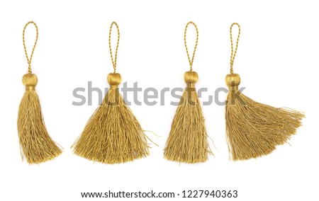 Set of golden silk tassels isolated on white background for creating graphic concepts