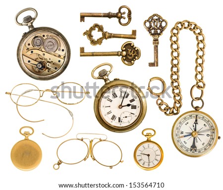set of golden vintage collectible accessories. antique keys, clock, compass, glasses isolated on white background