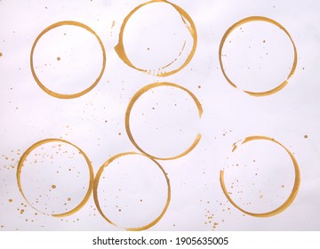 Set of golden yellow stains isolated on white paper background