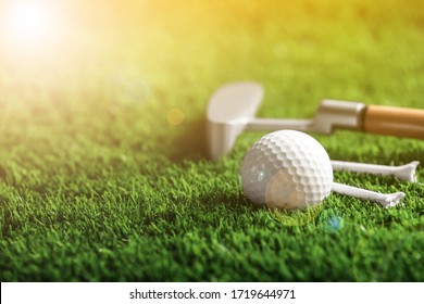 Set of golf equipment in park on sunny day. Space for design