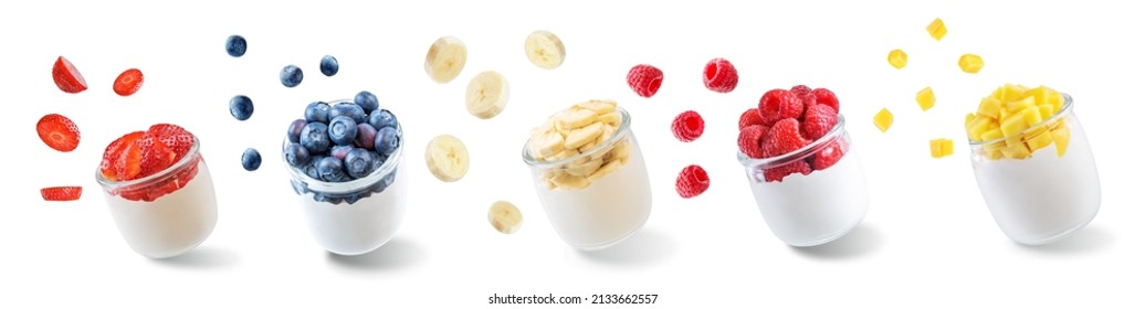 Set of Greek yogurt raspberry, mango, strawberry, blueberry, banana parfait in jars on a white isolated background. toning. selective focus - Powered by Shutterstock