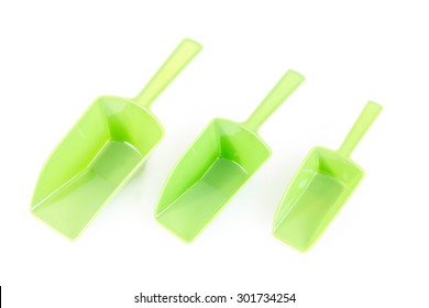 Set of green plastic scoop Isolated on white background.