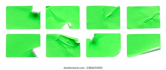 A set of green rectangular paper sticker label isolated on white background.