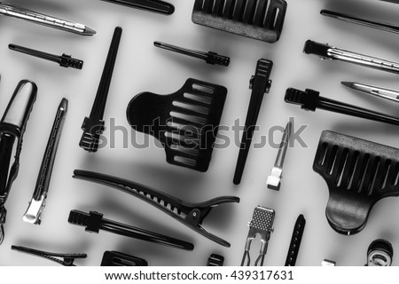 set of hair clips flat lay composition on light background
