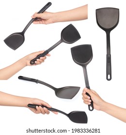 Set Of Hand Holding Black Spatula Isolated On White Background