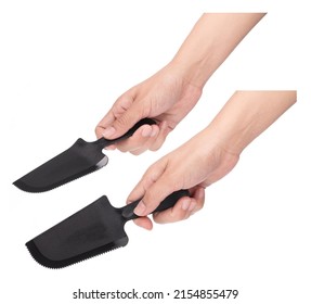 Set Of Hand Holding Knife Plastic Spatula Spreader Cake Cutter Isolated On White Background. 