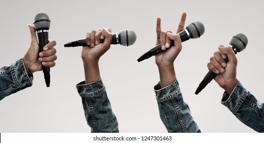 Set of hand holding microphone