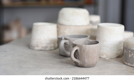  Set Of Handmade Ceramic Tableware And Pottery On Table In Creative Studio