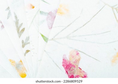 Set of Handmade recycled flower and leaf paper background. - Powered by Shutterstock - Get 15% off with code: PIKWIZARD15