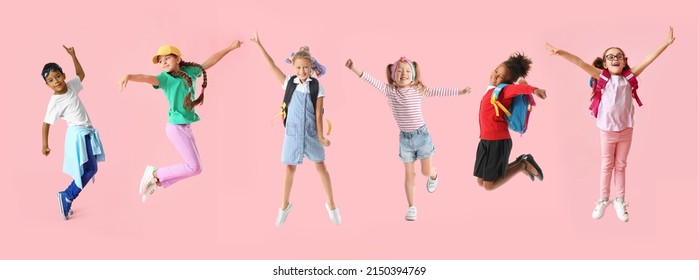 Set of happy little children on pink background