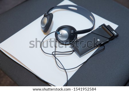 A set of headphones for simultaneous translation during negotiations in foreign languages. headphones used for simultaneous translation equipment simultaneous interpretation equipment