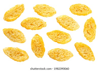 Set of homemade white bread croutons isolated on white background, top view. Crispy bread cubes, croutons isolated on white background. Crispy bread cubes, crackers, croutons, top view, macro.