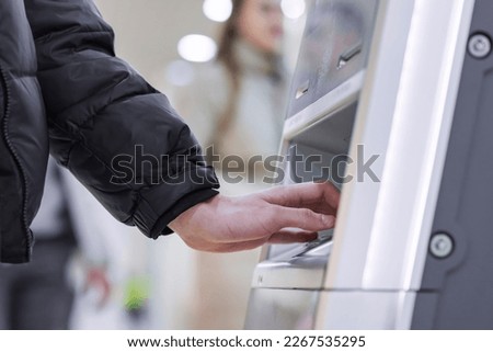 Set of icon in banking machine. Withdrawing money from an ATM by a teen