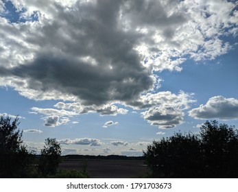 Set of images, fields under cloudy skies