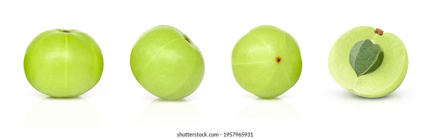 Set of Indian gooseberry fruits ( phyllanthus emblica ) and cut in half sliced isolated on white background. 