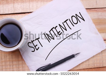 Set Intention. Motivational inspirational quotes words. Wooden background