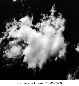 Set of isolated clouds over black background. Design elements. White isolated clouds. Cutout extracted clouds.