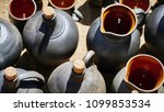 A set of jugs, bottles and pots for wine or oil. Antique vessels and pitchers on the shelves in the kit.