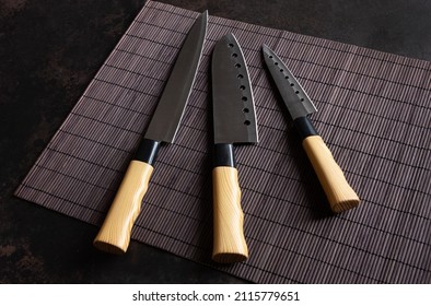 Set of kitchen knives with wooden handle,  top view, close up