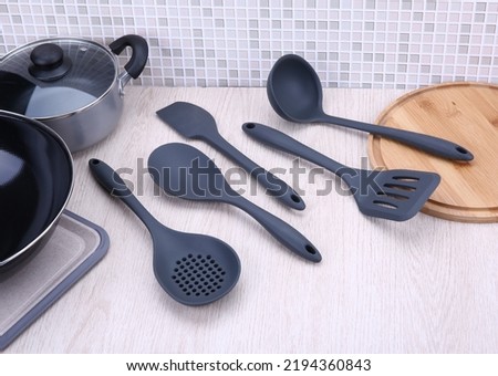 Set of kitchen utensils for cooking and culinary craftsmanship, spoon, ladle, scoop and shovel.