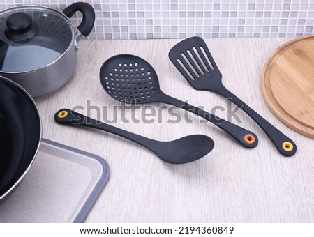 Set of kitchen utensils for cooking and culinary craftsmanship, spoon, ladle, scoop and shovel.
