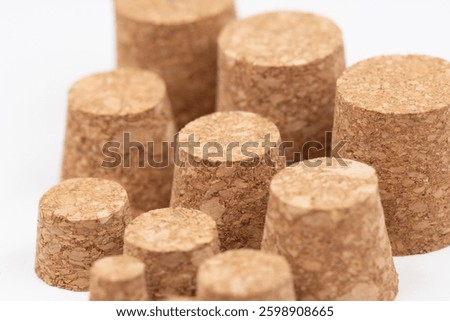 A set of large and small natural corks for glassware.