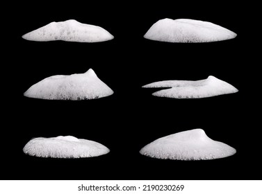 Set liquid white foam from soap or shampoo or shower gel. Abstract bubbles. isolated on a black background 