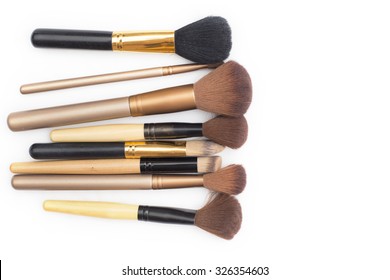 Set Of Makeup Brushes On White Background.