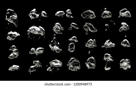 Set of many different air bubbles in the water isolated on black background