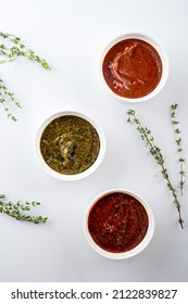 Set Marinade Sauces For BBQ Meat, Set Of Different Sauces For Barbecue, Tomato Sauce On White Background Copy Space