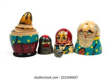 A Set Of Matryoshka Dolls Depicting Characters From A Russian Folk Tale. Isolated On White Background.