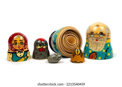 A Set Of Matryoshka Dolls Depicting Characters From A Russian Folk Tale. Isolated On White Background.