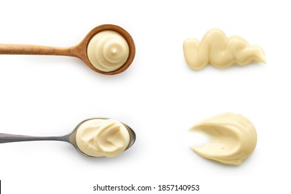 Set of Mayonnaise sauce in spoons top view isolated on white background