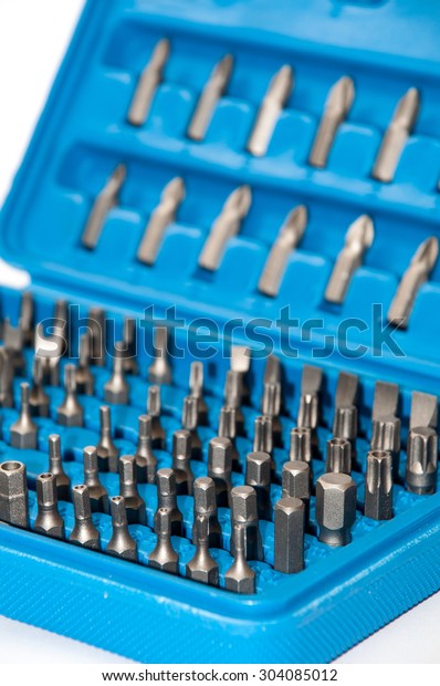 Set of metal bits in\
a blue plastic box.