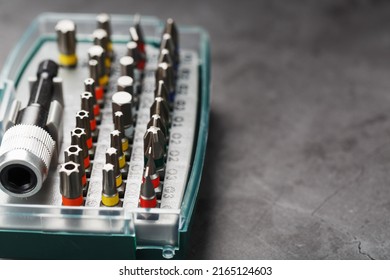 A Set Of Metal Bits For Screwdrivers In A Box. Hexagon Head Of Different Sizes